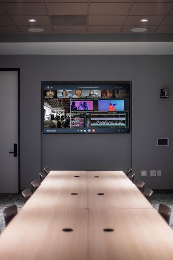 Conference room with CORE platform displayed on screen
