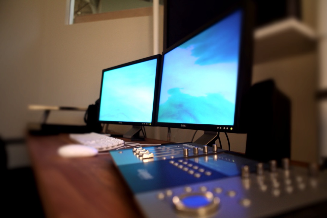 Color grading workstation with dual monitors and control surface